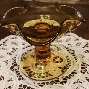 Vintage golden glass footed candy dish or dessert stand